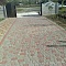 Оформление дорожек тротуарной плиткой  фирмы "Ландшафт"
